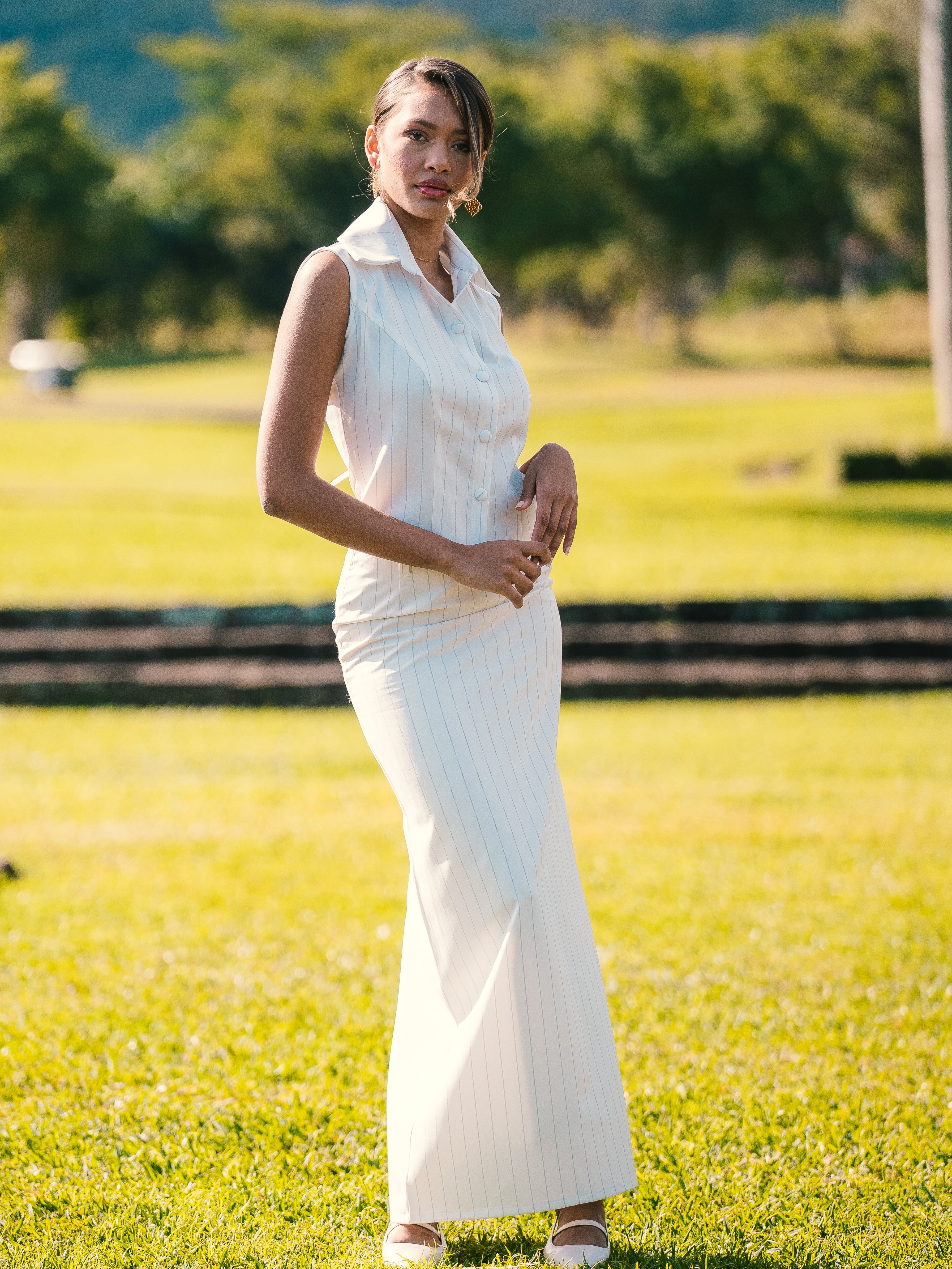 Sleeveless top and full-length column skirt